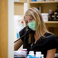 MarketPlace vet staffer on phone