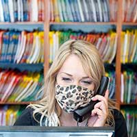 MarketPlace vet staffer on telephone